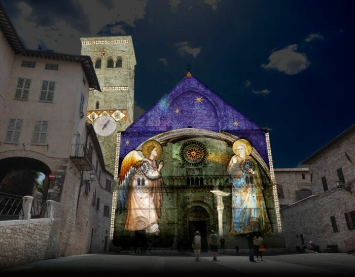 Giotto’s frescoes are projected on the facades of churches in Assisi