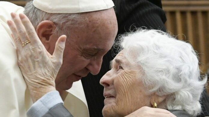 The pope with an elderly woman